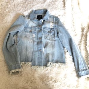 Distressed denim jacket